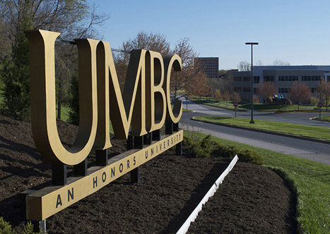 The campus sign; letters spelling out U M B C, located at the main entrance of the university