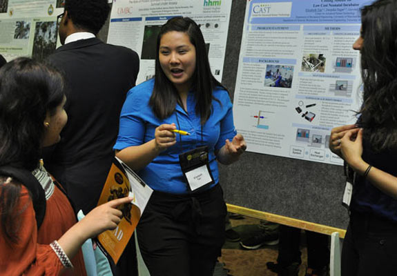 student presenting abstract annual research symposium