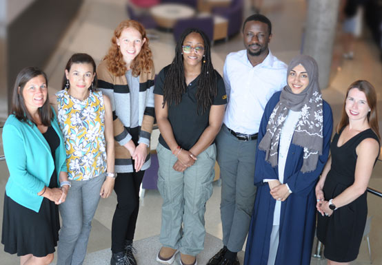 A group of instructors looking up to the camera